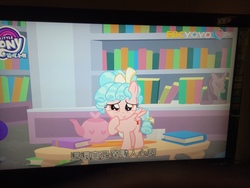 Size: 4160x3120 | Tagged: safe, screencap, cozy glow, pegasus, pony, g4, what lies beneath, book, bookshelf, female, filly, irl, photo, solo, subtitles, teapot, yoyotv