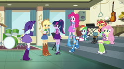 Size: 1912x1072 | Tagged: safe, screencap, applejack, fluttershy, pinkie pie, rainbow dash, rarity, sci-twi, spike, spike the regular dog, sunset shimmer, twilight sparkle, dog, dance magic, equestria girls, equestria girls specials, g4, angry, belt, boots, canterlot high, clothes, compression shorts, cowboy hat, cymbals, denim skirt, drum kit, drums, female, freckles, glasses, group, guitar, hand on hip, hat, high heel boots, humane five, humane seven, humane six, keyboard, legs, maracas, mary janes, musical instrument, ponytail, saxophone, sci-twi outfits, shoes, shorts, sitting, skirt, sleeveless, socks, stairs, stetson, striped socks, tambourine, tank top, triangle, xylophone