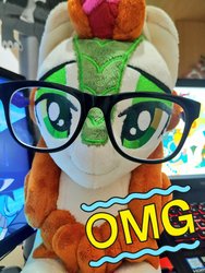 Size: 768x1024 | Tagged: safe, artist:burgunzik, autumn blaze, kirin, g4, sounds of silence, female, glasses, irl, lidded eyes, looking at you, omg, photo, plushie, smiling, solo