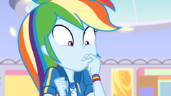 Size: 1164x655 | Tagged: safe, screencap, rainbow dash, dashing through the mall, equestria girls, equestria girls series, g4, holidays unwrapped, spoiler:eqg series (season 2), canterlot mall, female, finger in mouth, geode of super speed, magical geodes, solo