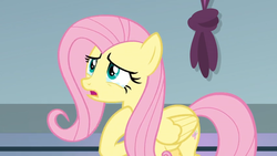 Size: 1366x768 | Tagged: safe, screencap, fluttershy, pegasus, pony, g4, the ending of the end, crying, female, folded wings, hoof on chest, mare, sad, solo, wings