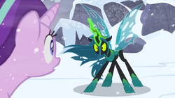 Size: 1366x768 | Tagged: safe, screencap, queen chrysalis, starlight glimmer, g4, the ending of the end, angry, aura, magic, magic aura, outdoors, snow, wind