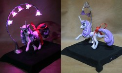 Size: 1024x614 | Tagged: safe, artist:ashenonedreamer, fleur-de-lis, pony, g4, bow, craft, female, for sale, licking, licking lips, looking back, mare, nightlight, pose, prancing, sculpture, solo, tail bow, tongue out