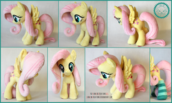Size: 3000x1794 | Tagged: safe, artist:lioncubcreations, fluttershy, pegasus, pony, g4, clothes, female, irl, photo, plushie, socks, solo, spread wings, striped socks, wings