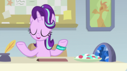Size: 1920x1080 | Tagged: safe, screencap, starlight glimmer, pony, unicorn, student counsel, bracelet, eyes closed, female, geode, inkwell, jewelry, mare, open mouth, quill, smiling, solo, starlight's office