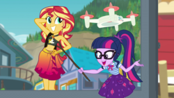 Size: 900x506 | Tagged: safe, edit, edited screencap, screencap, sci-twi, sunset shimmer, twilight sparkle, equestria girls, equestria girls series, forgotten friendship, g4, holidays unwrapped, spoiler:eqg series (season 2), belly button, chalkboard, clothes, geode of empathy, lidded eyes, magical geodes, selfie drone, sexy, sleeveless, sunset selfie, swimsuit