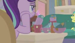 Size: 1369x790 | Tagged: safe, screencap, ocellus, starlight glimmer, earth pony, pony, unicorn, g4, student counsel, bowl, chocolate, desk, disguise, disguised changeling, female, food, guidance counselor, hot chocolate, mare, mug, pony ocellus, starlight's office, tea