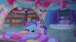 Size: 1280x720 | Tagged: safe, screencap, starlight glimmer, pony, unicorn, g4, student counsel, balloon, bipedal, bipedal leaning, chalkboard, female, glowing horn, horn, leaning, mare, party cannon, solo
