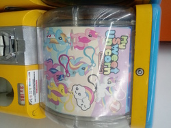 Size: 3120x4160 | Tagged: safe, alicorn, pony, bootleg, gachapon, my sweet unicorn, photo, rainbow, sideways, toy