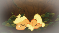 Size: 1920x1080 | Tagged: safe, screencap, applejack, earth pony, pony, g4, going to seed, eyes closed, female, filly, filly applejack, floppy ears, freckles, leaves, solo, younger