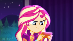 Size: 1280x720 | Tagged: safe, screencap, sunset shimmer, equestria girls, equestria girls series, the last drop, spoiler:choose your own ending (season 2), spoiler:eqg series (season 2), female, music festival outfit, phone, solo, the last drop: sunset shimmer