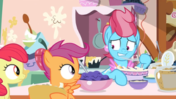Size: 1600x900 | Tagged: safe, screencap, apple bloom, cup cake, scootaloo, g4, the big mac question, batter, bowl, food, kitchen, mixing, nervous, nervous smile, pan, spoon, tired