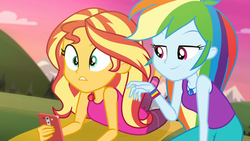 Size: 1920x1080 | Tagged: safe, screencap, rainbow dash, sunset shimmer, equestria girls, g4, my little pony equestria girls: choose your own ending, wake up!, wake up!: rainbow dash, cellphone, clothes, duo, duo female, female, geode of super speed, magical geodes, mountain, mountain range, outdoors, pants, phone, smartphone, tank top, yoga mat, yoga pants