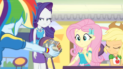 Size: 1600x900 | Tagged: safe, screencap, applejack, fluttershy, rainbow dash, rarity, dashing through the mall, equestria girls, equestria girls specials, g4, my little pony equestria girls: better together, my little pony equestria girls: holidays unwrapped, burger, clothes, dress, female, food, geode of fauna, geode of shielding, geode of super strength, hat, magical geodes, masking tape, present, rainbow, rarity peplum dress, tape, unamused, wrapped, wristband