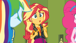 Size: 1600x900 | Tagged: safe, screencap, pinkie pie, rainbow dash, sunset shimmer, equestria girls, equestria girls specials, g4, my little pony equestria girls: better together, my little pony equestria girls: holidays unwrapped, clothes, female, geode of empathy, jacket, lockers, magical geodes, nervous, pointing
