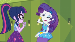 Size: 1600x900 | Tagged: safe, screencap, rarity, sci-twi, twilight sparkle, equestria girls, equestria girls specials, g4, my little pony equestria girls: better together, my little pony equestria girls: holidays unwrapped, bowtie, braces, cellphone, clothes, dress, faic, faint, female, geode of shielding, geode of telekinesis, glasses, lockers, magical geodes, phone, ponytail, skirt