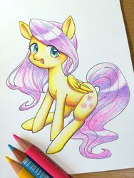 Size: 1560x2080 | Tagged: safe, artist:lp9hsa, fluttershy, pegasus, pony, g4, colored pencil drawing, colored pencils, cute, female, folded wings, irl, looking at you, mare, open mouth, photo, shyabetes, sitting, smiling, solo, three quarter view, traditional art, wings