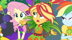 Size: 1600x900 | Tagged: safe, screencap, fluttershy, rainbow dash, rarity, sunset shimmer, equestria girls, equestria girls series, g4, holidays unwrapped, o come all ye squashful, spoiler:eqg series (season 2), alternate hairstyle, carrot, cornucopia costumes, curls, female, food, frown, leaves, shrug, shrugset shimmer, spikes