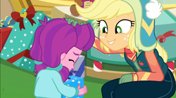 Size: 1922x1080 | Tagged: safe, screencap, applejack, lily longsocks, equestria girls, equestria girls series, g4, holidays unwrapped, winter break-in, spoiler:eqg series (season 2), canterlot mall, child, clothes, cute, daaaaaaaaaaaw, duo, duo female, female, gift giving, hat, present, sweet dreams fuel, vest, wholesome, winter hat, winter outfit