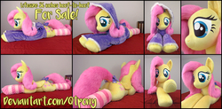 Size: 6235x3060 | Tagged: safe, artist:qtpony, fluttershy, pony, g4, absurd resolution, bow, clothes, cute, hoodie, irl, life size, photo, plushie, prone, shyabetes, socks, solo, striped socks, tail bow