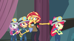 Size: 1920x1080 | Tagged: safe, screencap, apple bloom, scootaloo, sunset shimmer, sweetie belle, all the world's off stage, equestria girls, g4, my little pony equestria girls: better together, apple bloom's bow, bow, clipboard, clothes, cutie mark crusaders, director, director shimmer, female, hair bow, headset, helmet, mining helmet, overalls, pickaxe, shovel