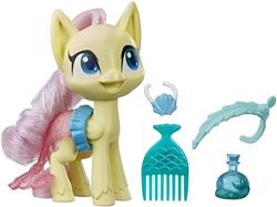Size: 1067x800 | Tagged: safe, fluttershy, mermaid, pegasus, pony, g4.5, brush, brushable, doll, female, first my little pony: pony life picture on derpibooru, hasbro, irl, it begins, mare, merchandise, photo, pony history, reveal the magic, toy