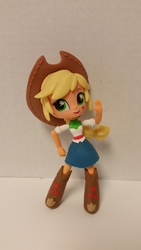 Size: 5312x2988 | Tagged: safe, applejack, equestria girls, g4, applejack's hat, belt, boots, clothes, cowboy hat, cutie mark on human, denim skirt, doll, equestria girls minis, hat, irl, photo, shoes, skirt, solo, stetson, toy