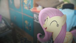 Size: 1280x720 | Tagged: safe, fluttershy, pegasus, pony, g4, eyes closed, female, irl, mare, photo, ponies in real life, smiling, solo