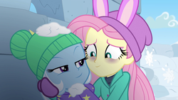 Size: 1920x1080 | Tagged: safe, screencap, fluttershy, trixie, equestria girls, equestria girls series, g4, holidays unwrapped, spoiler:eqg series (season 2), bags under eyes, bunny ears, clothes, duo, duo female, female, out of context, shipping fuel, snow, spoiler, text, winter outfit