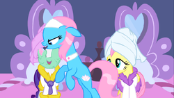 Size: 1136x640 | Tagged: safe, screencap, aloe, fluttershy, lotus blossom, rarity, earth pony, pegasus, pony, unicorn, g4, green isn't your color, applying, bathrobe, clothes, female, floppy ears, mare, mud mask, open mouth, robe, smiling, spa, towel on head