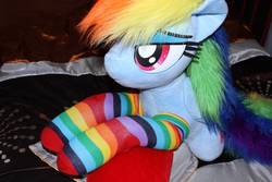 Size: 1095x730 | Tagged: safe, artist:ponimalion, rainbow dash, pegasus, pony, g4, bed, bedroom eyes, clothes, female, irl, life size, lying down, mare, photo, pillow, plushie, prone, rainbow socks, socks, striped socks