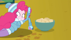 Size: 1600x900 | Tagged: safe, screencap, pinkie pie, blizzard or bust, equestria girls, equestria girls series, g4, holidays unwrapped, spoiler:eqg series (season 2), bowl, clothes, female, food, jacket, lying down, mittens, potato, solo, sprinkles, toque, winter outfit