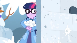 Size: 1600x900 | Tagged: safe, screencap, sci-twi, twilight sparkle, equestria girls, equestria girls series, g4, holidays unwrapped, saving pinkie's pie, spoiler:eqg series (season 2), clothes, coat, female, glasses, holding, ponytail, snow, snowball, snowman, taking cover, wall, winter