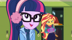 Size: 1600x900 | Tagged: safe, screencap, sci-twi, sunset shimmer, twilight sparkle, equestria girls, equestria girls series, g4, holidays unwrapped, winter break-in, spoiler:eqg series (season 2), bag, book, clothes, earmuffs, female, glasses, gloves, jacket, lockers, ponytail, winter outfit