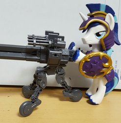 Size: 2024x2048 | Tagged: safe, artist:omegapony16, shining armor, pony, unicorn, g4, armor, guardians of harmony, gun, high res, irl, male, misadventures of the guardians, photo, rearing, royal guard, shield, solo, stallion, toy, unshorn fetlocks, weapon
