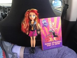 Size: 1024x768 | Tagged: source needed, useless source url, safe, sunset shimmer, equestria girls, g4, my little pony equestria girls: rainbow rocks, book, car, doll, female, irl, photo, solo, toy