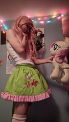 Size: 2688x1512 | Tagged: safe, artist:lilfluttertrap, fluttershy, human, g4, clothes, cosplay, costume, crossdressing, crossplay, irl, irl human, male, photo, plushie, skirt, tank top, trap