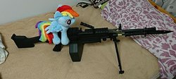 Size: 1440x646 | Tagged: safe, artist:omegapony16, rainbow dash, pegasus, pony, g4, bayonet, bed, female, gun, irl, m249, mare, photo, plushie, toy, weapon