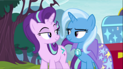 Size: 1669x939 | Tagged: safe, screencap, starlight glimmer, trixie, pony, unicorn, g4, road to friendship, cape, clothes, cropped, duo, female, lidded eyes, looking at each other, mare, smiling, trixie's cape