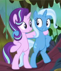 Size: 810x940 | Tagged: safe, screencap, starlight glimmer, trixie, pony, unicorn, g4, road to friendship, bipedal, cropped, duo, female, holding each other, hoof on hip, looking at each other, mare, smiling, standing on two hooves