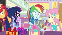 Size: 1920x1080 | Tagged: safe, screencap, applejack, fluttershy, rainbow dash, sci-twi, sunset shimmer, twilight sparkle, dashing through the mall, equestria girls, equestria girls specials, g4, my little pony equestria girls: better together, my little pony equestria girls: holidays unwrapped, bad gift wrapping, canterlot mall, drink, female, food, geode of fauna, geode of super speed, geode of telekinesis, gift giving, glasses, magical geodes, orange, present, soda, strawberry