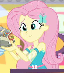 Size: 698x794 | Tagged: safe, screencap, fluttershy, rainbow dash, dashing through the mall, equestria girls, equestria girls series, g4, holidays unwrapped, spoiler:eqg series (season 2), bad gift wrapping, burger, canterlot mall, chair, clothes, cropped, cute, dress, female, flower, fluttershy boho dress, food, geode of fauna, gift giving, gift wrapped, hairclip, jewelry, magical geodes, mall, necklace, offscreen character, present, shyabetes, sitting, smiling, stamp, table, waistband