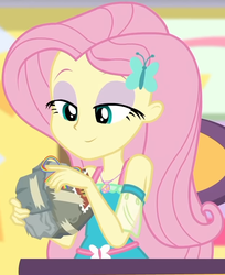 Size: 627x768 | Tagged: safe, screencap, fluttershy, dashing through the mall, equestria girls, equestria girls specials, g4, my little pony equestria girls: better together, my little pony equestria girls: holidays unwrapped, bad gift wrapping, burger, canterlot mall, chair, clothes, cropped, cute, dress, eyeshadow, female, flower, fluttershy boho dress, food, geode of fauna, gift giving, gift wrapped, hairclip, jewelry, lidded eyes, looking down, magical geodes, makeup, mall, necklace, present, shyabetes, sitting, smiling, stamp, table, waistband