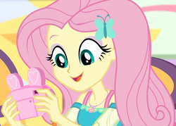 Size: 1505x1080 | Tagged: safe, screencap, fluttershy, dashing through the mall, equestria girls, equestria girls series, g4, holidays unwrapped, spoiler:eqg series (season 2), camera, canterlot mall, chair, clothes, cropped, cute, dress, female, female focus, fluttershy boho dress, geode of fauna, hairclip, happy, jewelry, magical geodes, mall, necklace, present, shyabetes, sitting, smiling