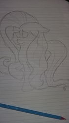 Size: 3264x1836 | Tagged: safe, artist:treble clefé, fluttershy, pegasus, pony, g4, cute, female, hidden wings, lined paper, monochrome, pencil, pencil drawing, photo, shyabetes, solo, traditional art