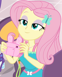 Size: 799x997 | Tagged: safe, screencap, fluttershy, rarity, dashing through the mall, equestria girls, equestria girls series, g4, holidays unwrapped, spoiler:eqg series (season 2), bunny ears, camera, canterlot mall, clothes, cropped, cute, dress, female, flower, fluttershy boho dress, geode of fauna, hairclip, happy, jewelry, lidded eyes, looking up, magical geodes, mall, necklace, present, shyabetes, smiling, waistband