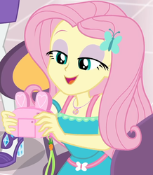 Size: 857x985 | Tagged: safe, screencap, fluttershy, rarity, dashing through the mall, equestria girls, equestria girls series, g4, holidays unwrapped, spoiler:eqg series (season 2), bunny ears, camera, canterlot mall, chair, clothes, cropped, cute, dress, female, flower, fluttershy boho dress, geode of fauna, gift giving, hairclip, happy, jewelry, lidded eyes, looking down, magical geodes, mall, necklace, present, shyabetes, sitting, smiling, table, waistband