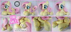 Size: 5010x2247 | Tagged: safe, artist:lioncubcreations, fluttershy, pegasus, pony, g4, auction, irl, lying down, photo, plushie, solo