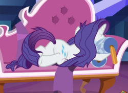 Size: 676x492 | Tagged: safe, screencap, rarity, pony, unicorn, dragon dropped, g4, butt, cropped, fainting couch, female, holding, lying down, mare, marshmelodrama, messy mane, pillow, plot, rarity being rarity, solo