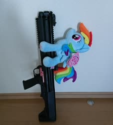 Size: 1857x2048 | Tagged: safe, artist:omegapony16, rainbow dash, pegasus, pony, g4, female, gun, irl, kel-tec ksg-12, mare, photo, plushie, shotgun, toy, weapon